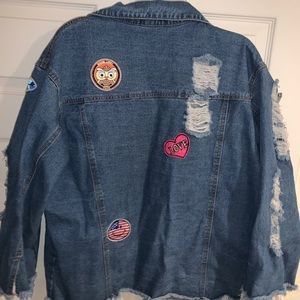 Over sized patched / ripped Jean jacket